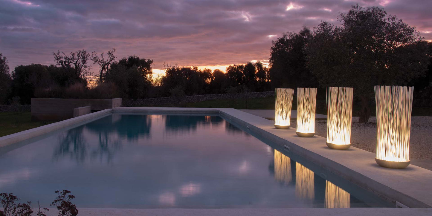 Don't Touch outdoor floor lamps by pool