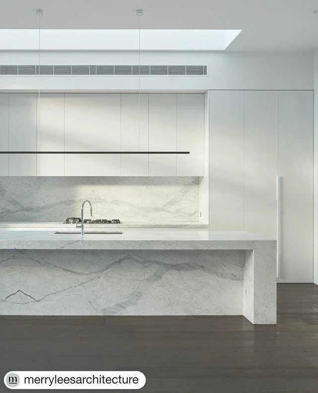 Highline Linear Pendant in Black over White Marble Kitchen Island