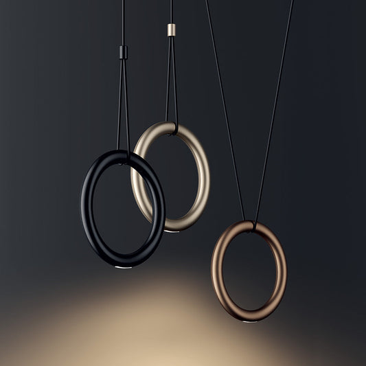 Lodes Ivy pendants in black, champagne and terra with a dark background