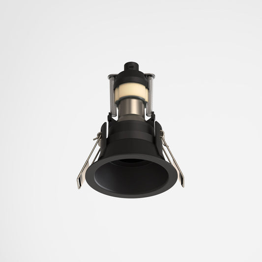 Black spotlight on a white background