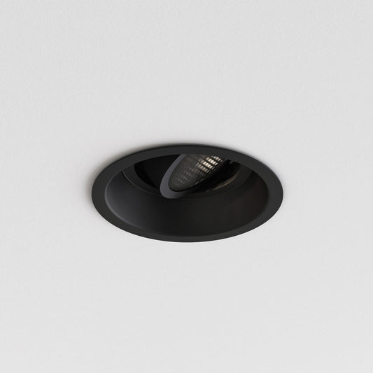 Black recessed ceiling light on a white background