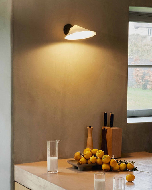 DCW Editions Plume wall light with over kitchen island with fruit