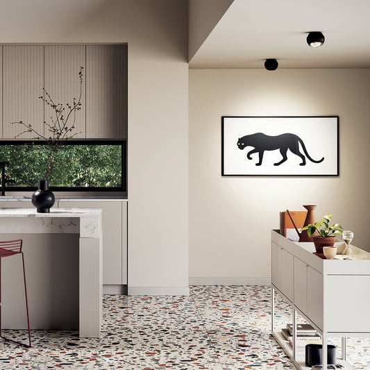 Lodes Spider spot lights in black finish in modern home, illuminating panther print and console table