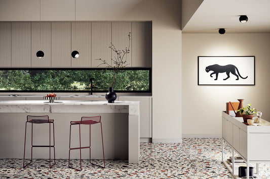 Lodes Spider pendants and spot lights in black finish in a modern kitchen with a panther print