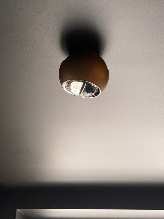 Bronze spot light with clear crystal lens