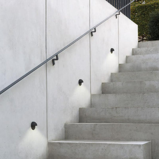 Astro tivola step light in black on outdoor concrete stairs