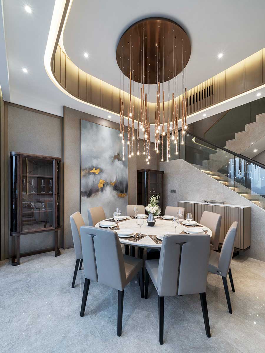 Lodes A-Tube Nano pendant in rose gold over round dining table in a house in St. Barts