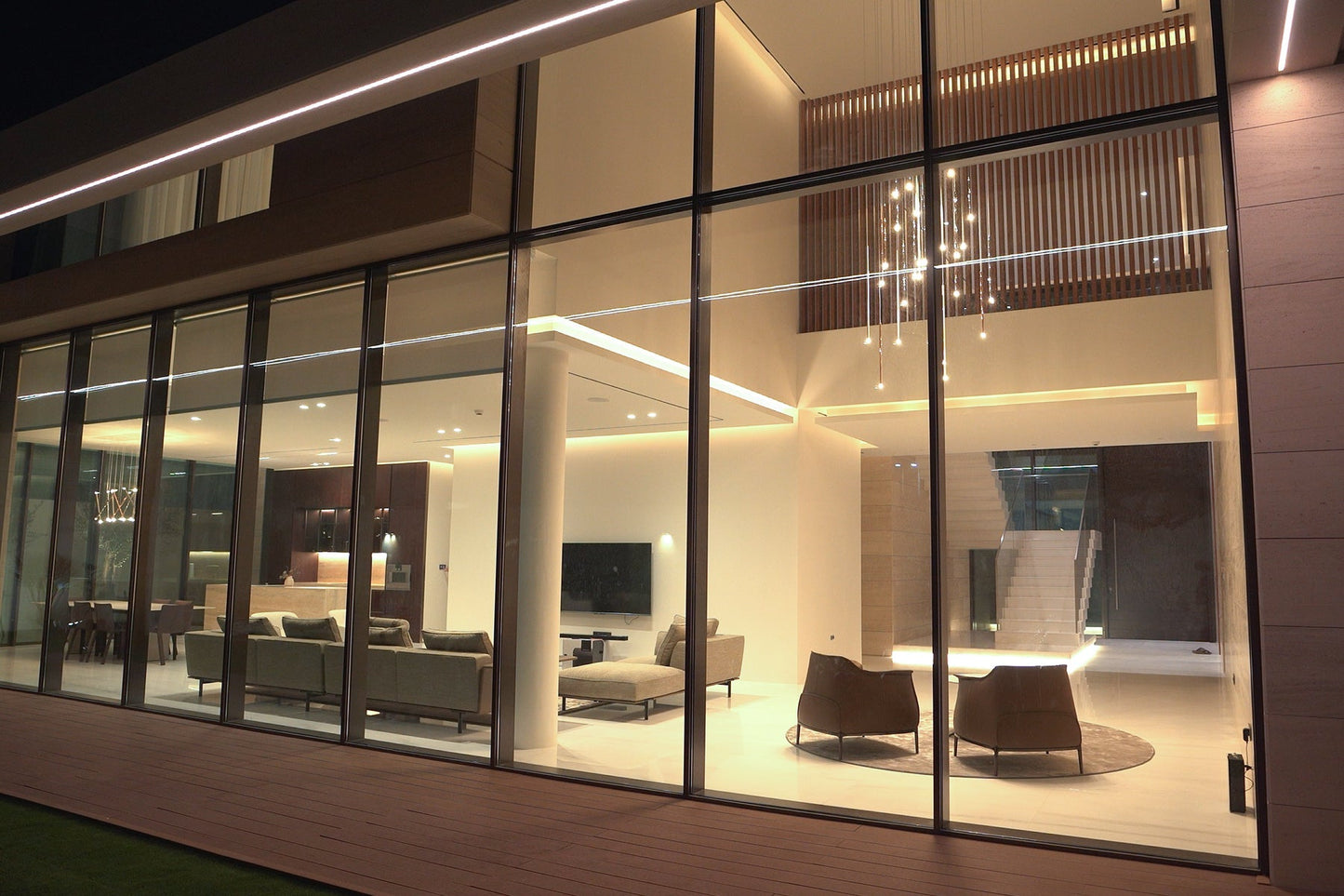 Lodes A-Tube Nano pendant cluster in modern home with high ceilings