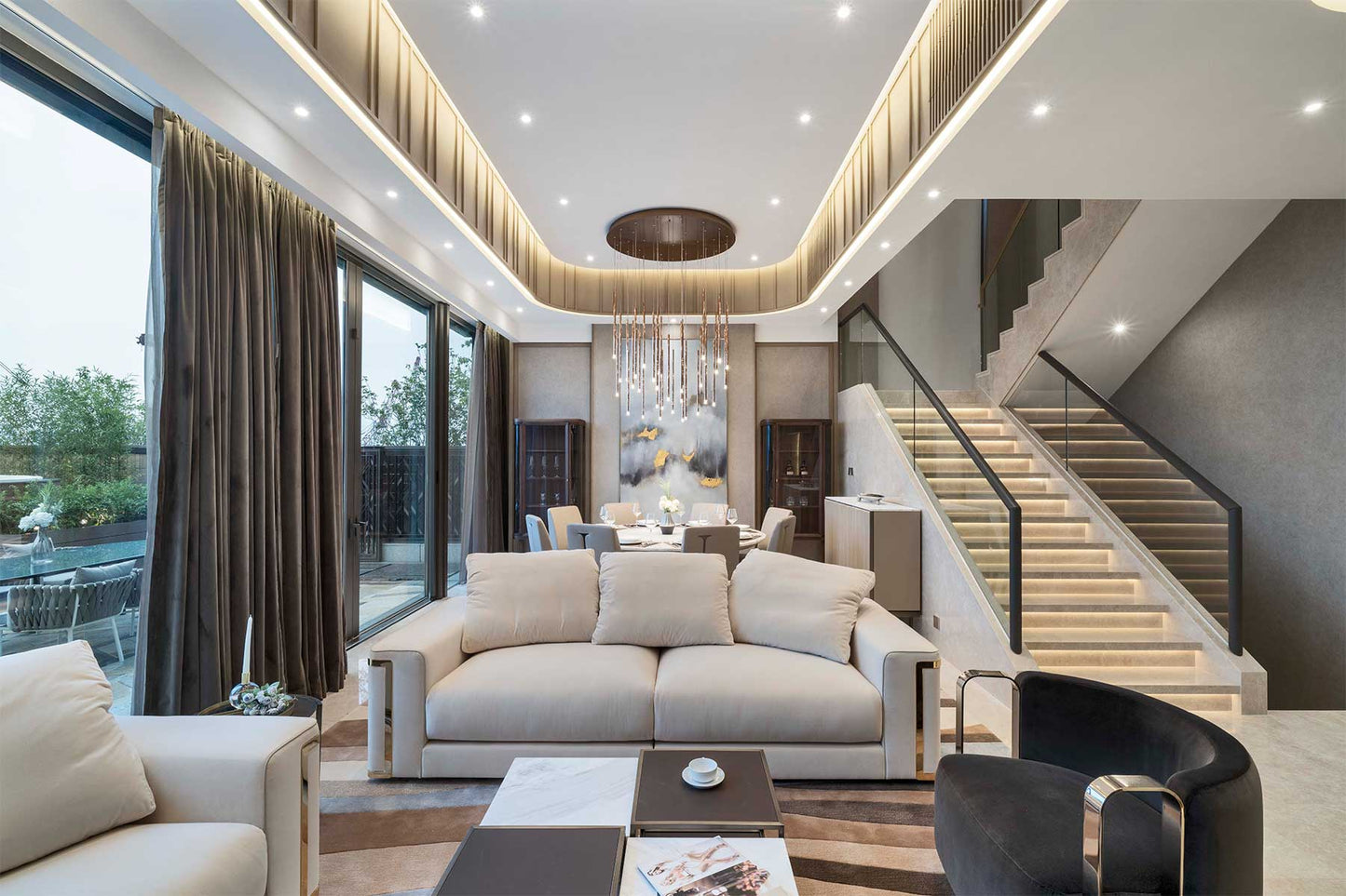 Lodes A-Tube Nano pendant cluster in rose gold over dining table in luxury home