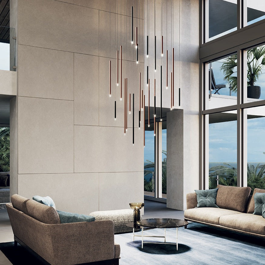 Lodes A-Tube Nano pendant cluster in large lounge with high ceilings