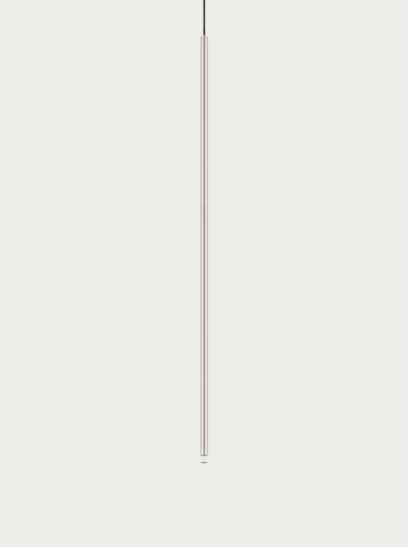 Lodes A-Tube Nano XL pendant in champagne with grey background and black cable