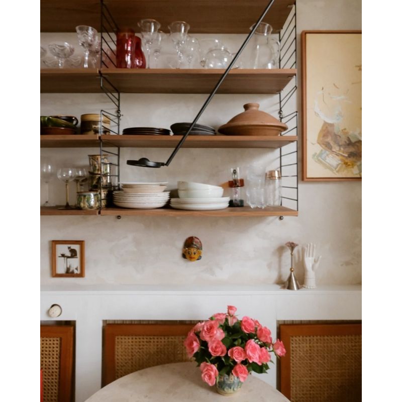 DWC Editions Aaro wall light over small breakfast table with roses
