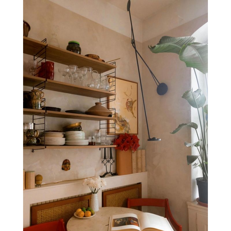 DWC Editions Aaro wall light over small breakfast table