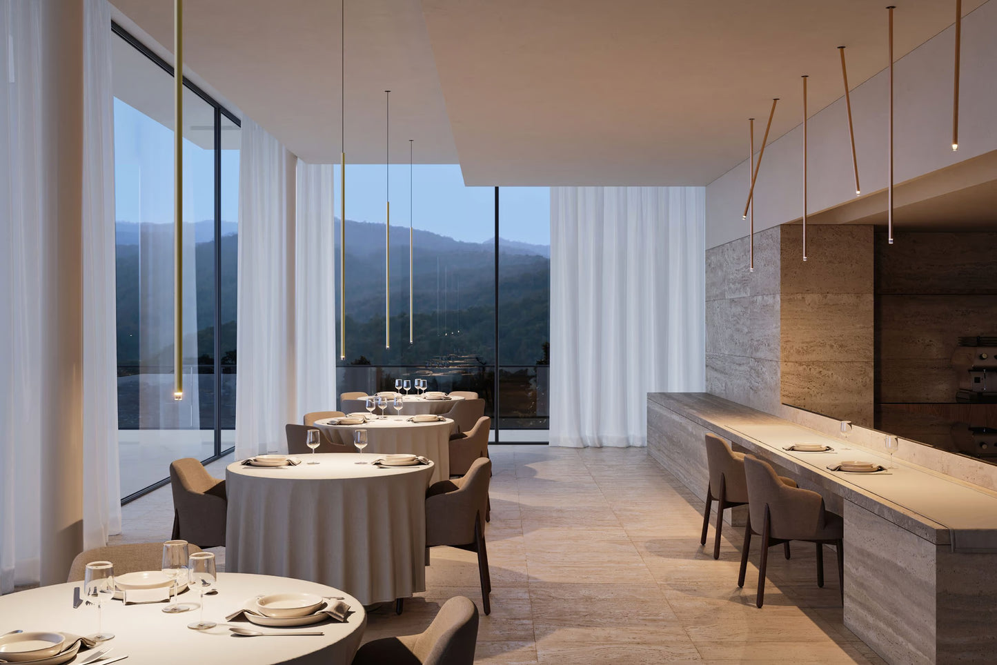 Lodes A-Tube Nano pendants and swing ceiling lights in a modern restaurant with views of mountains