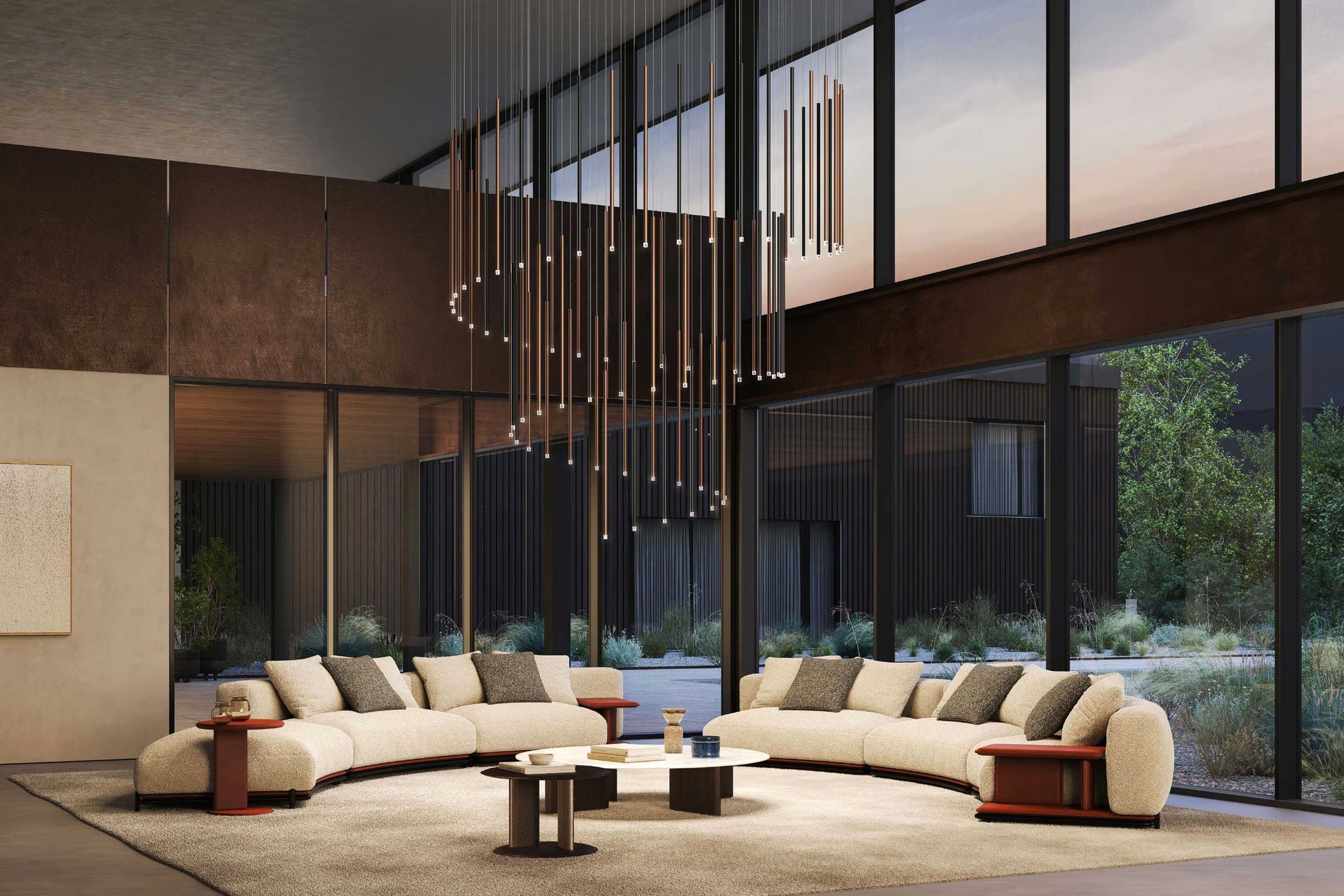Lodes A-Tube Nano pendants in terra finish in a spiral cluster over a large lounge seating area with curved sofas