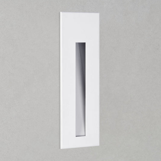 Rectangular white light fixture on a gray background