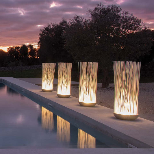 Don't Touch outdoor floor lamps by pool