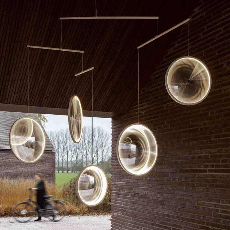 DCW Editions gold Focus pendant with 5 circles with brick and wood