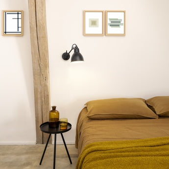 Gras-N104-Wall-Black-Bedside-with-Yellow-Bedding