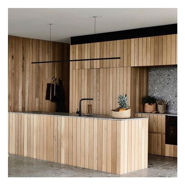 Highline Linear Pendant in Black in Slatted Light Wood Kitchen with Black Tap