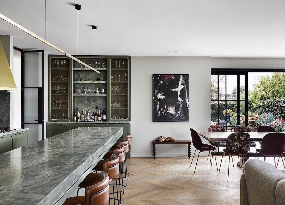 Highline_Satin_Brass_Linear_Pendant_Doubled_over_Green_Kitchen_Island_Angled_View