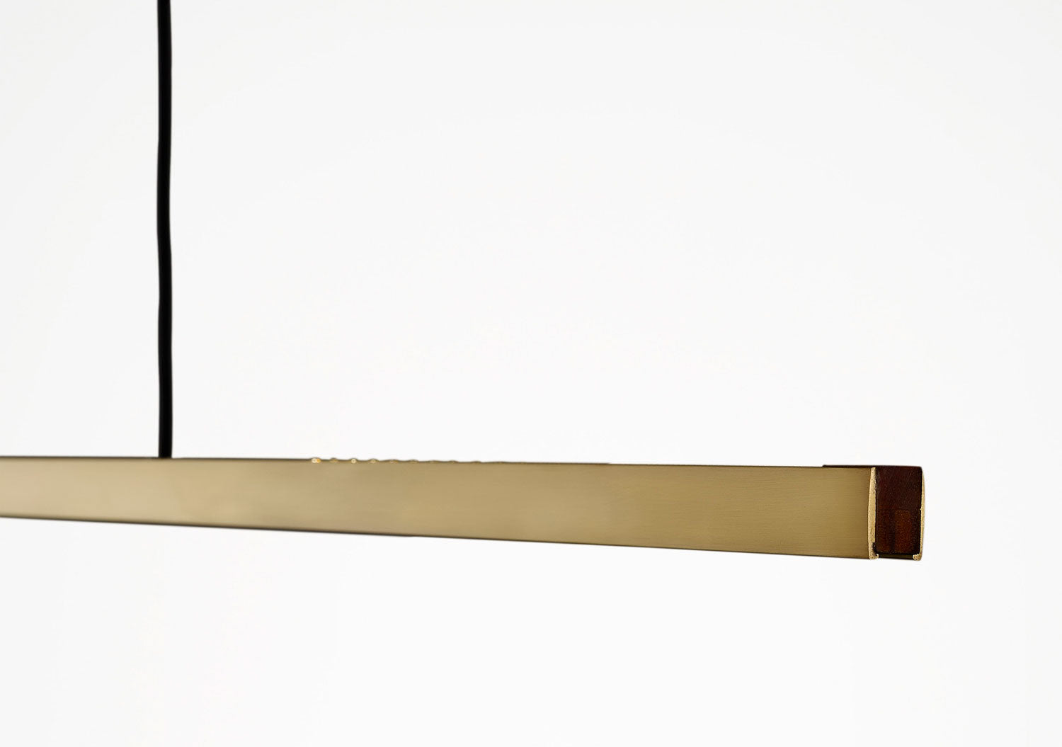 Highline in Brass with Walnut End Cap Detail