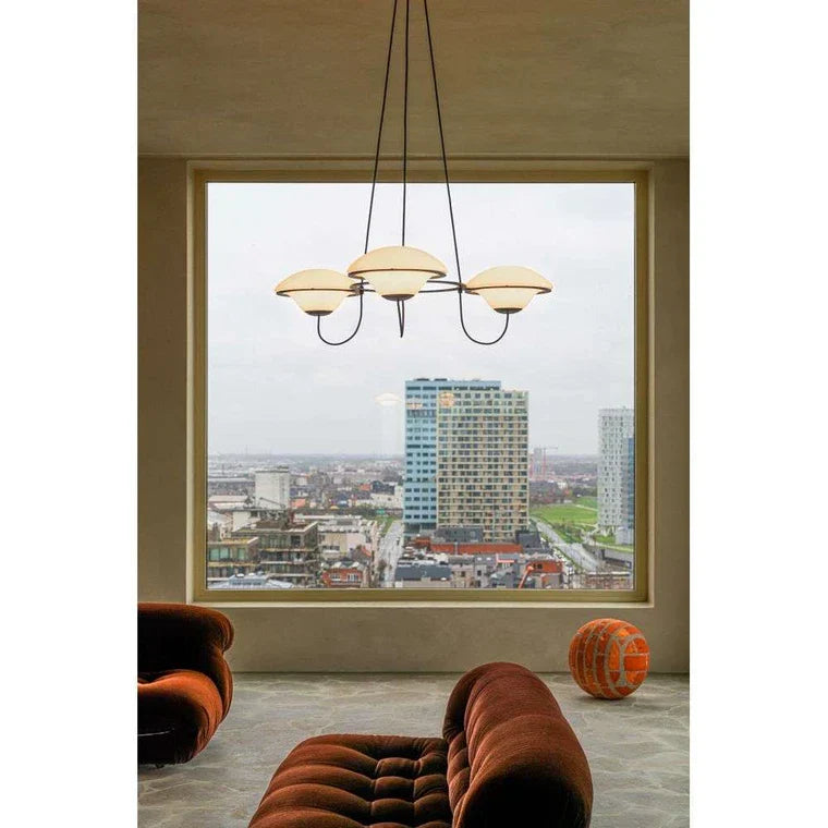 DCW Editions In The Air pendant with 3 shades in modern lounge in front of window