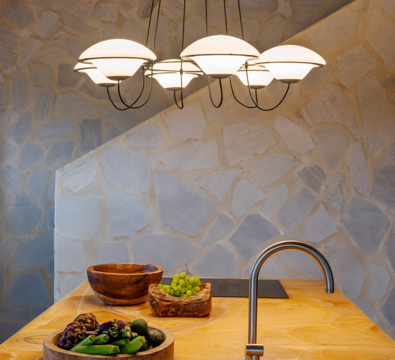DCW Editions In The Air pendant with 5 shades over kitchen island with grapes