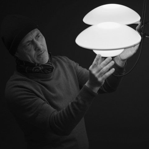 DCW Editions In The Air pendant with being looked at by the designer