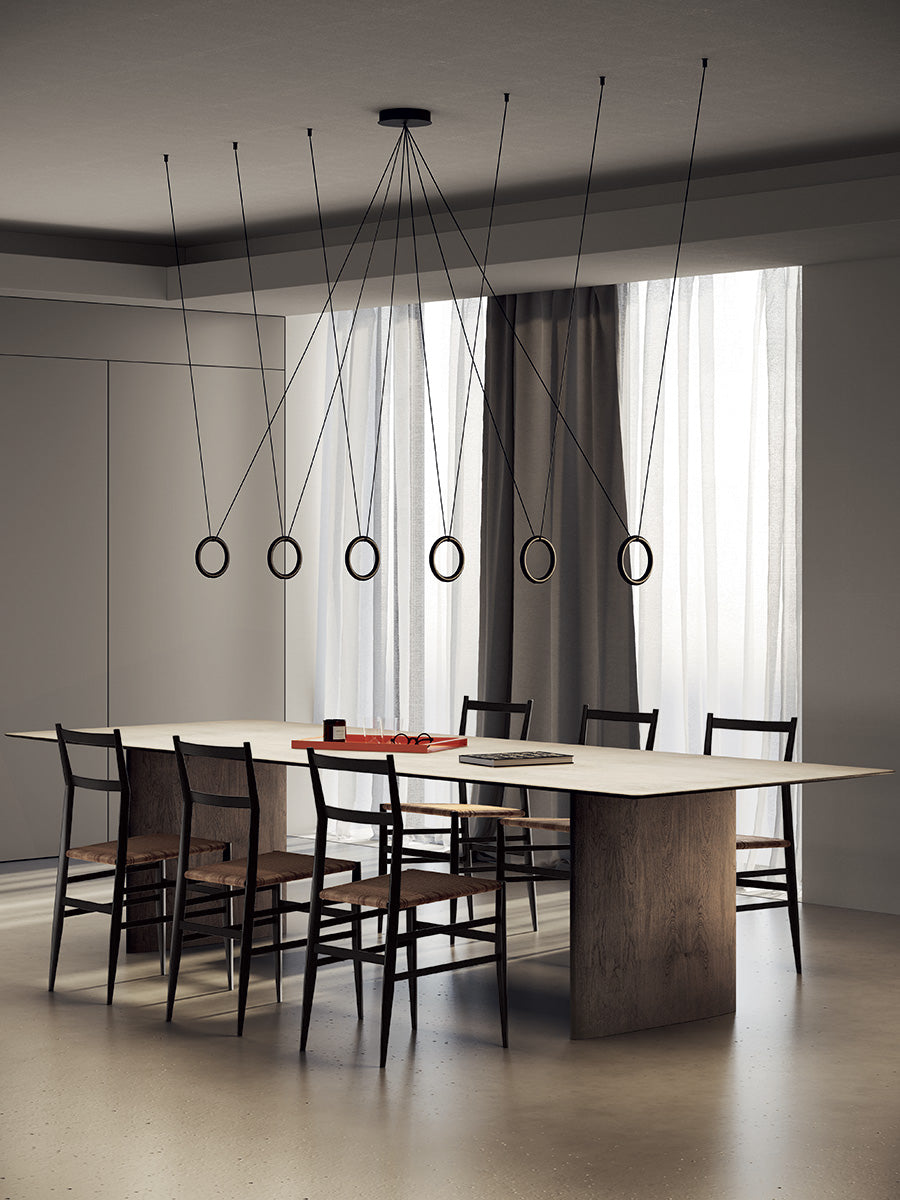 Lodes Ivy V pendants over rectangle dining table
