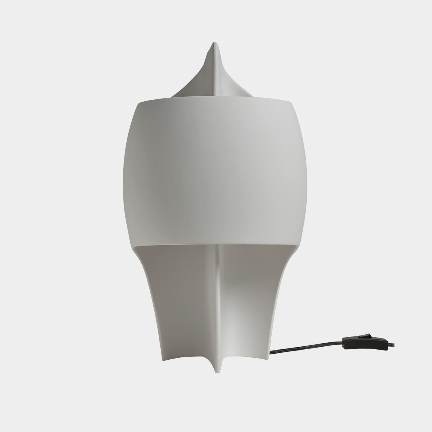 DCW Editions Lamp B table lamp with black cord on white background