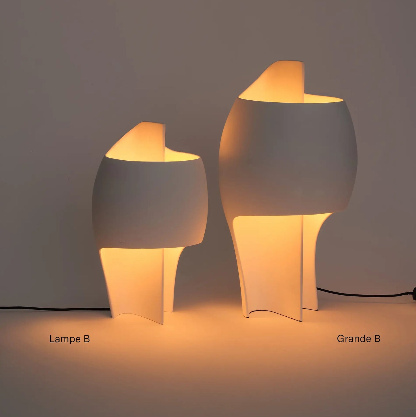 DCW Editions LampeB Grande and LampeB table lamp illuminated next to each other