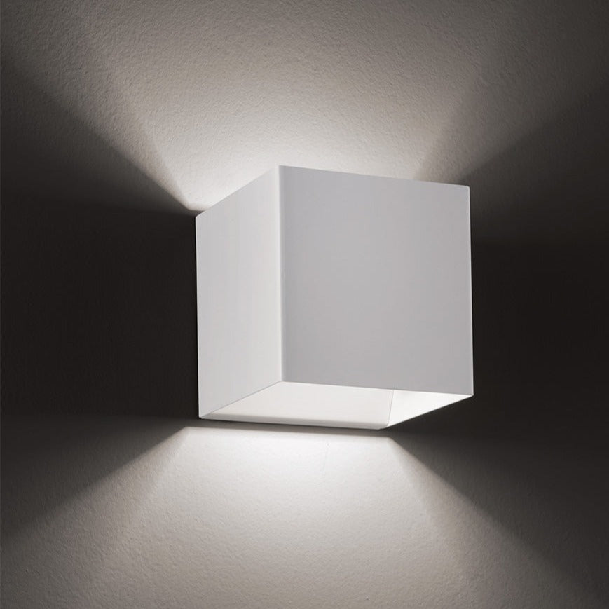 Square wall light fixture on a dark background
