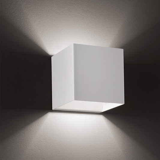 Square wall light fixture on a dark background