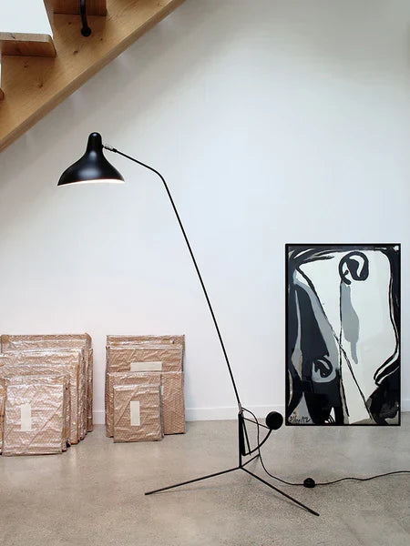 DCW Editions Mantis floor lamp BS1 with art work on the floor
