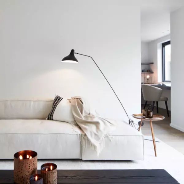 DCW Editions Mantis floor lamp BS1 with blocky white sofa and round side table