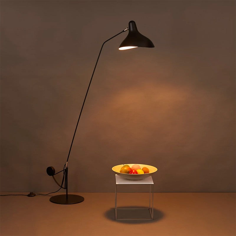 DCW Editions Mantis floor lamp BS1 illuminating a fruit bowl 