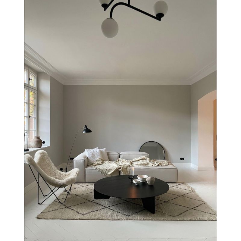 DCW Editions Mantis floor lamp BS1 in small, stylish lounge with neutral colours