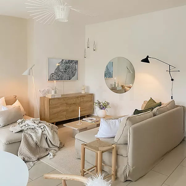 DCW Editions Mantis plug-in wall light BS2 in small, stylish lounge with neutral colours