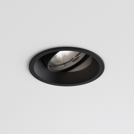 Black recessed ceiling light on a white background
