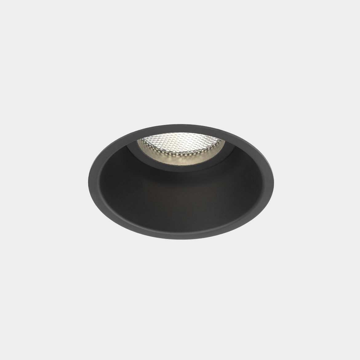 Black round recessed ceiling light on a white background
