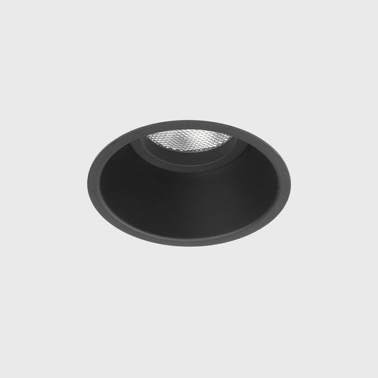 Black round light fixture on a gray background