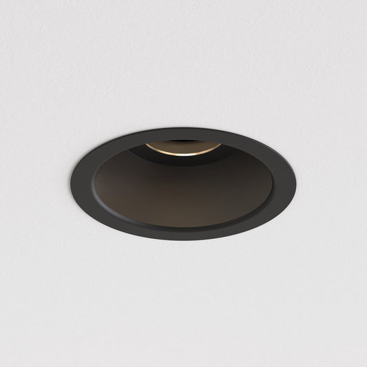 Black recessed ceiling light on a white background