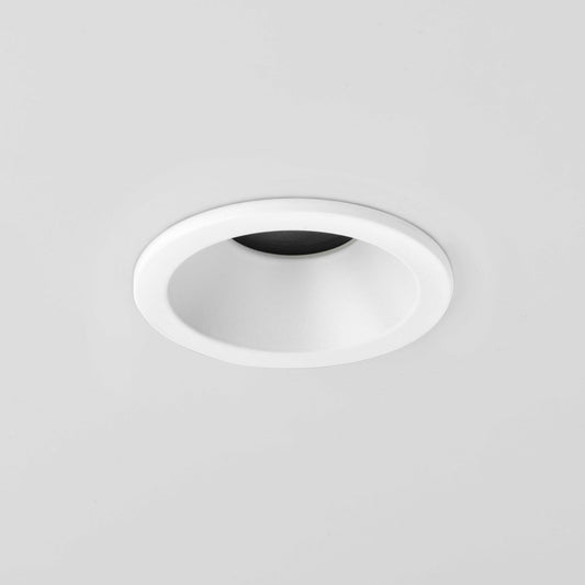 Round recessed ceiling light on a gray background