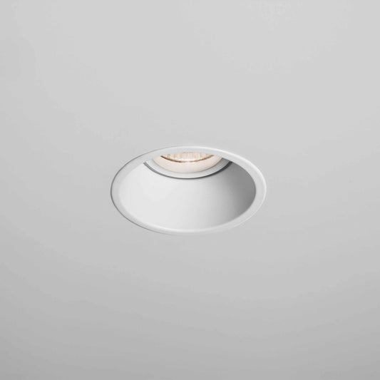 Round recessed ceiling light on a gray background