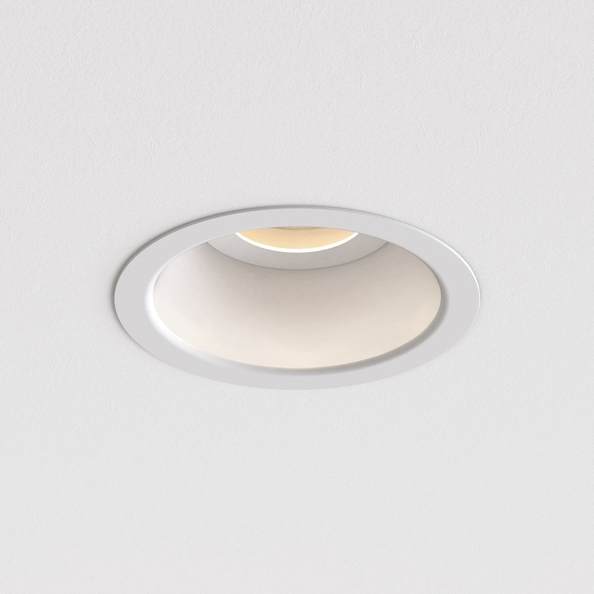 Round recessed ceiling light on a white background