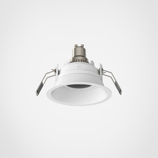 White recessed ceiling light on a gray background