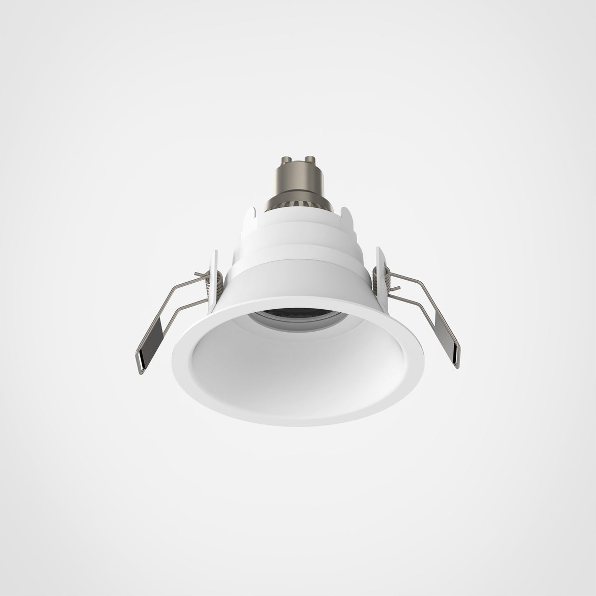 White recessed ceiling light on a gray background