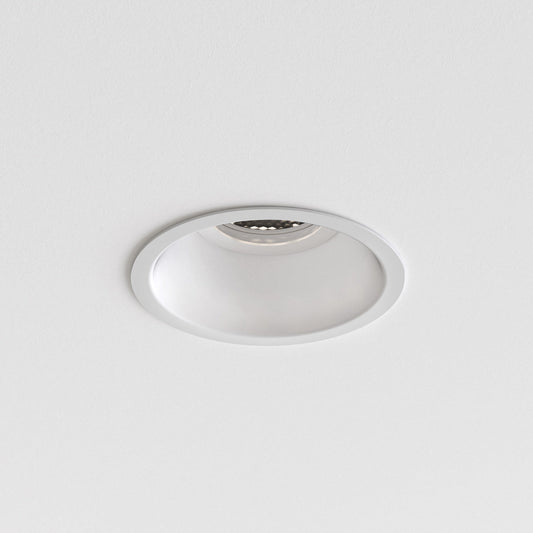 White recessed ceiling light on a gray background