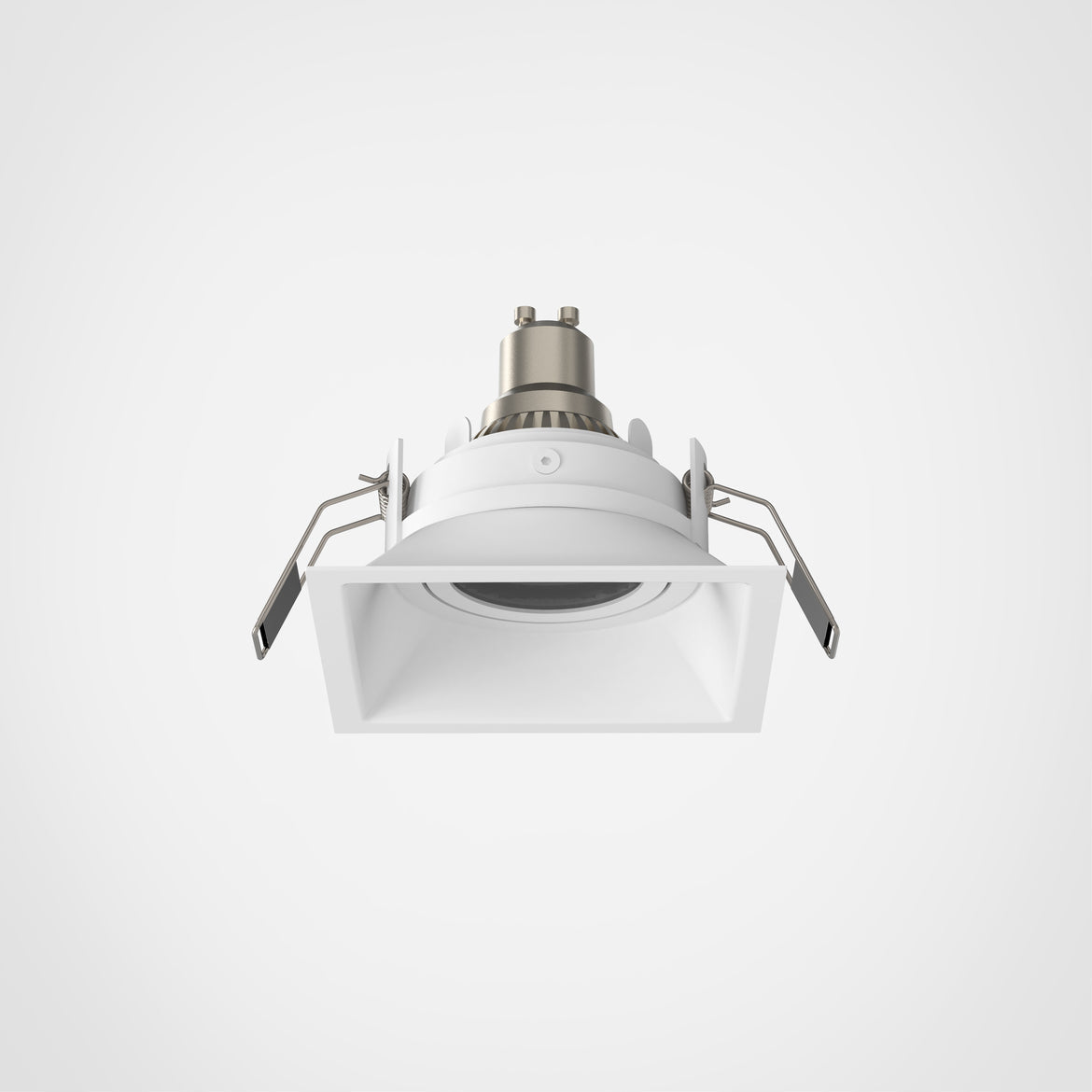 White recessed ceiling light on a gray background